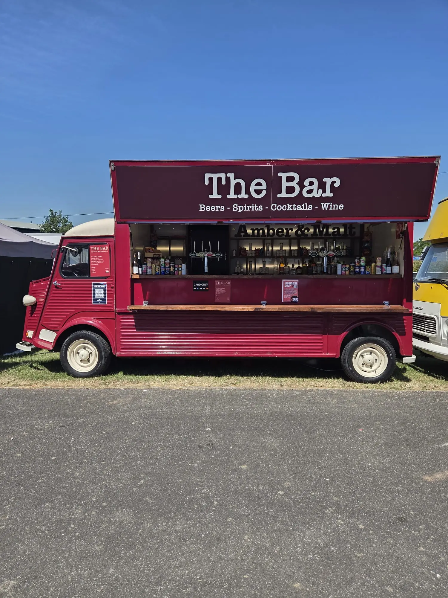 Amber and Malt burgundy mobile bar fully stocked for service